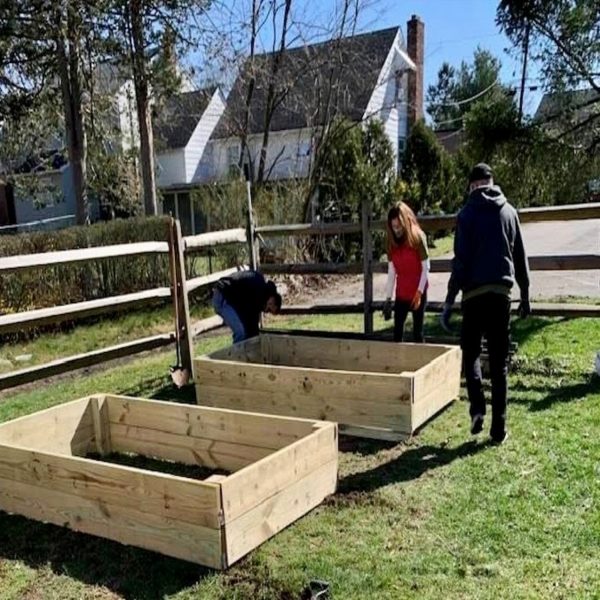 Matt_Jessie_and_Sean_Positioning_the_Garden_Bed